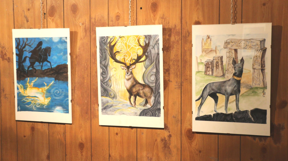 Alcuni dei quadri che Angela Betta Casale ha realizzato appositamente per le illustrazioni del libro, ora esposti al Garage di Arte e Cultura di piazza Statuto 15 a Torino