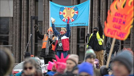 UCTP Representative Chali'naru Dones (at center) opens the 4th Annual Pioneer Valley Women's March on Saturday, January 18, 2020, with a spiritual invocation. 
Photo: Kevin Gutting 