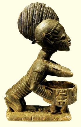 Statua preistorica del popolo Yoruba dell’Africa del Nord, raffigurante una figura femminile che tiene in mano la Coppa della Conoscenza